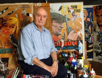the painter mimmo rotella in his studio is seated on a news photo 1643628451 scaled e1704211727957 bdb7b472 - Home - 9 Ricordando Mimmo Rotella, a Catanzaro la mostra ‘Autorotella’