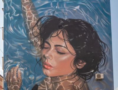 murales Mandioh Cosenza Gulia urbana 1 a d89ab12e - Home - 36 “Oltre il muro del silenzio”, il murale di Mandioh a Cosenza per le donne